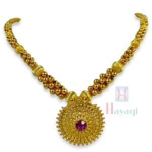Golden Thushi Broad Rava Pendant