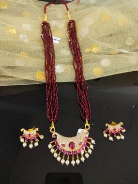 Maroon Crystal Mala With Traditional Pendant