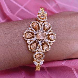 Golden Chain Bajuband Cum Bracelet In AD Stone